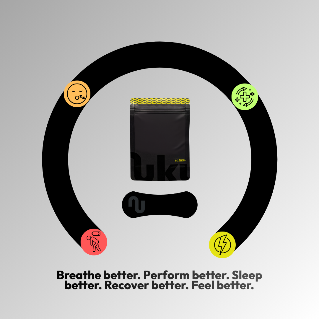 Product packaging with a black circle and various icons on a gray background, featuring text about health benefits.