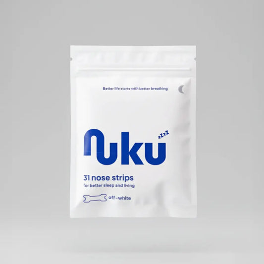 Package of 31 Nuku nasal strips; off-white nasal strips designed to improve breathing, sleep quality, and daily wellbeing.